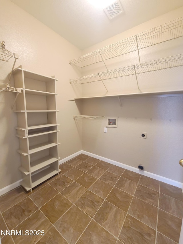580 Boulder Peak Ct, Sparks, NV 89436 - washroom featuring hookup for a washing machine, electric dryer hookup, and baseboards