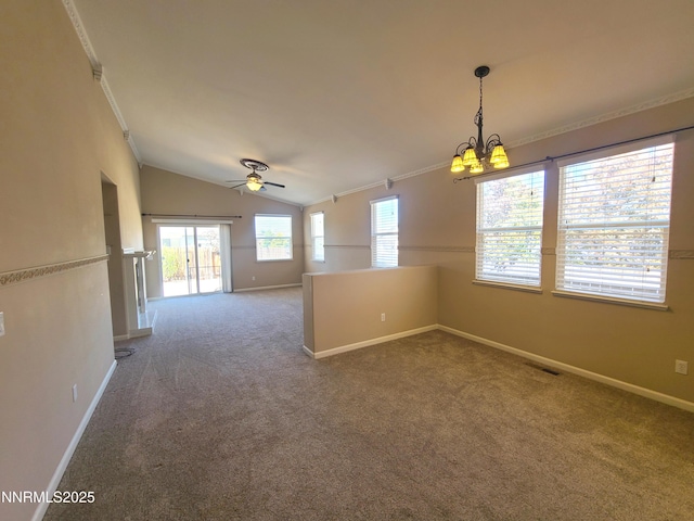 580 Boulder Peak Ct, Sparks, NV 89436 - carpeted spare room featuring a chandelier, lofted ceiling, ceiling fan, baseboards, and crown molding