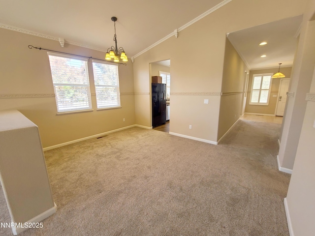 580 Boulder Peak Ct, Sparks, NV 89436 - carpeted spare room with baseboards, ornamental molding, a chandelier, and vaulted ceiling
