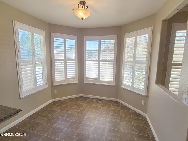 580 Boulder Peak Ct, Sparks, NV 89436 - unfurnished dining area with baseboards