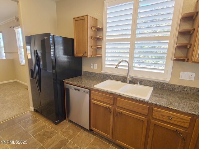 580 Boulder Peak Ct, Sparks, NV 89436 - kitchen featuring stainless steel dishwasher, open shelves, a sink, brown cabinets, and dark countertops