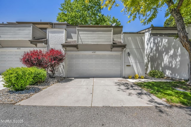 4307 Clyde Ct, Reno, NV 89509 - view of front facade featuring concrete driveway