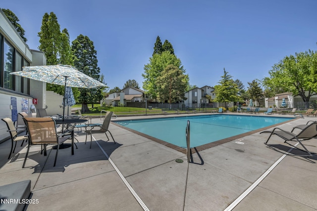 4307 Clyde Ct, Reno, NV 89509 - community pool featuring a patio and a residential view