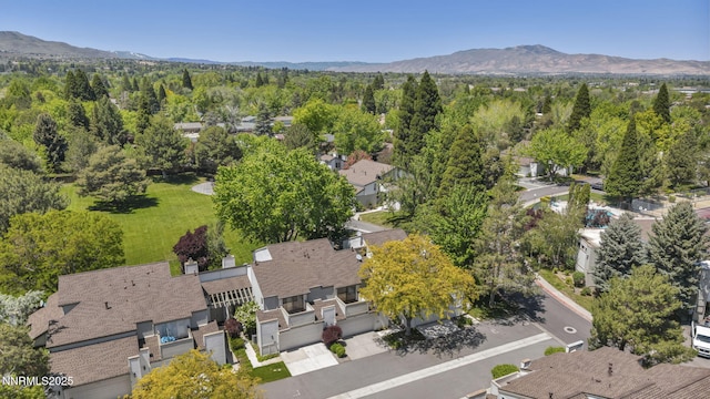 4307 Clyde Ct, Reno, NV 89509 - aerial perspective of suburban area featuring a mountain backdrop and a forest