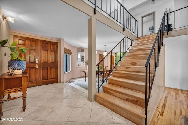 4307 Clyde Ct, Reno, NV 89509 - foyer entrance featuring stairway and baseboards
