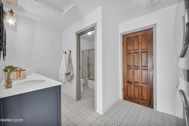 4307 Clyde Ct, Reno, NV 89509 - full bath with tile patterned floors, an enclosed shower, toilet, double vanity, and baseboards