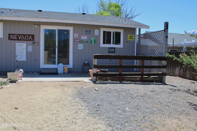 1311 Yellowjacket Ln, Gardnerville, NV 89460 - back of house featuring a shingled roof