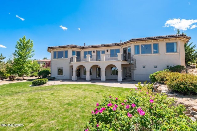 14200 Wild Quail Ct, Reno, NV 89511 - rear view of property with stairs, a lawn, a patio, and a balcony