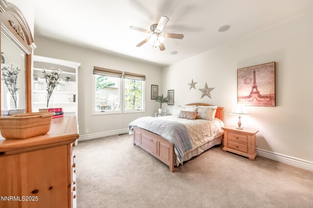 14200 Wild Quail Ct, Reno, NV 89511 - bedroom with light carpet, baseboards, and a ceiling fan