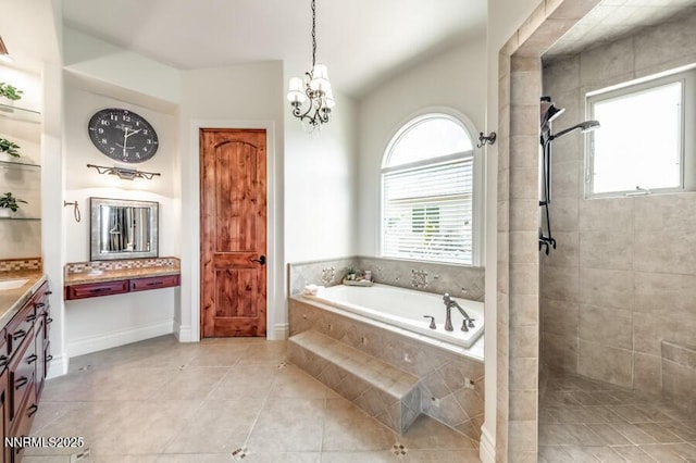 14200 Wild Quail Ct, Reno, NV 89511 - full bathroom with vanity, a bath, a tile shower, a chandelier, and lofted ceiling