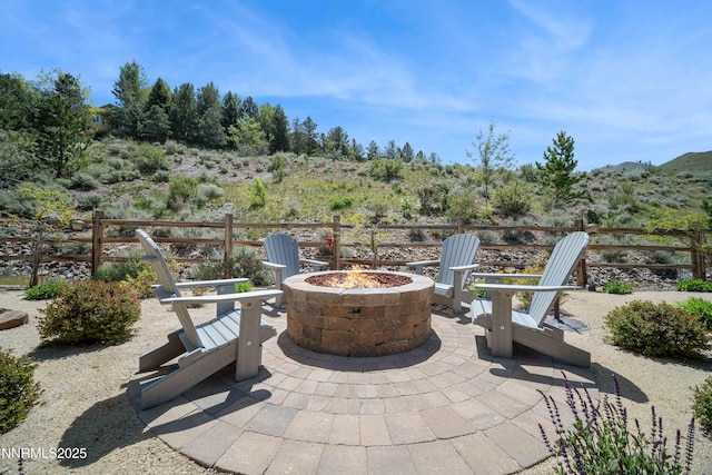 4069 Whispering Pine Loop, Reno, NV 89519 - view of patio featuring an outdoor fire pit