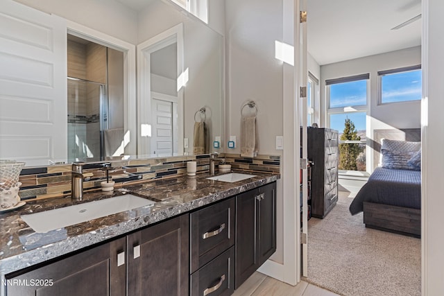 4069 Whispering Pine Loop, Reno, NV 89519 - full bathroom with double vanity, a shower stall, and ensuite bathroom