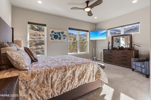 4069 Whispering Pine Loop, Reno, NV 89519 - carpeted bedroom with recessed lighting, multiple windows, and a ceiling fan