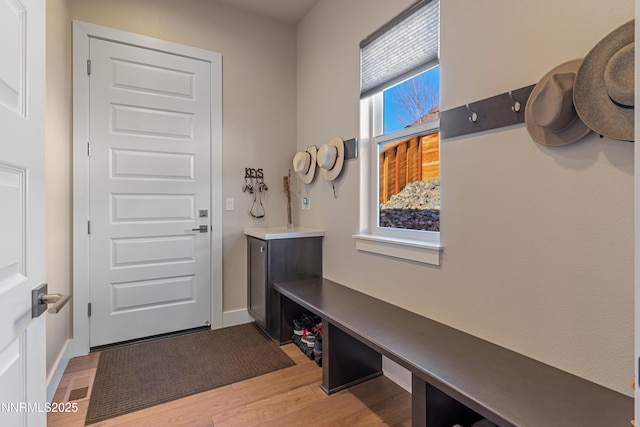4069 Whispering Pine Loop, Reno, NV 89519 - mudroom featuring wood finished floors and baseboards