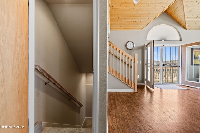 2140 Conestoga Rd, Reno, NV 89521 - staircase featuring wooden ceiling, vaulted ceiling, wood finished floors, and baseboards