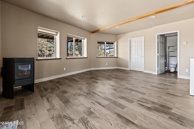 2140 Conestoga Rd, Reno, NV 89521 - unfurnished living room with wood finished floors, recessed lighting, and baseboards