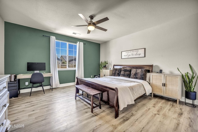 2028 Whitecliff Dr, Reno, NV 89521 - bedroom with wood finished floors, a desk, a textured ceiling, baseboards, and ceiling fan