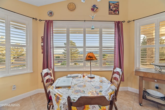 1184 Stephanie Way, Minden, NV 89423 - tiled dining room with baseboards