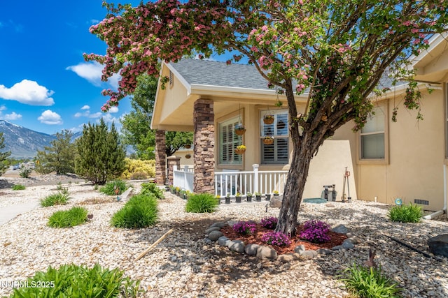 1184 Stephanie Way, Minden, NV 89423 - view of front of house featuring covered porch, stucco siding, and a mountain view