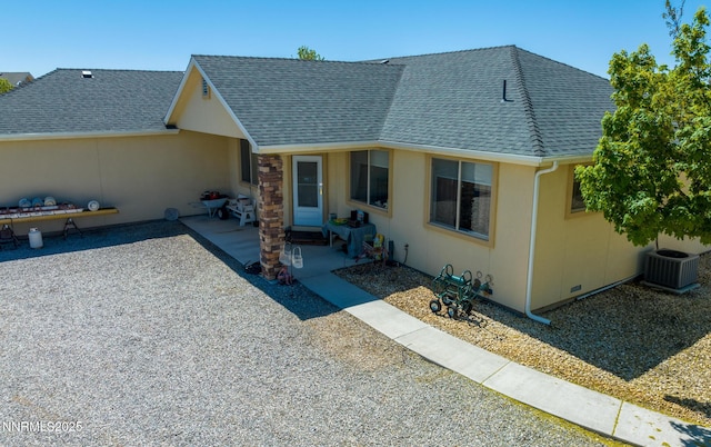 1184 Stephanie Way, Minden, NV 89423 - view of front of home featuring central AC, roof with shingles, and a patio