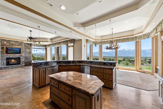 1103 Cortez Ln, Gardnerville, NV 89410 - kitchen featuring a sink, a spacious island, dishwasher, open floor plan, and recessed lighting
