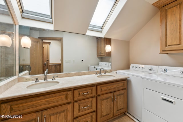 1103 Cortez Ln, Gardnerville, NV 89410 - laundry area with a skylight and washer and clothes dryer
