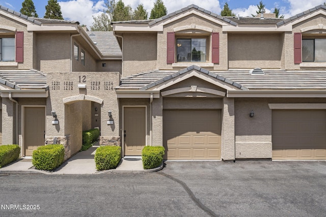 900 S Meadows Pkwy Unit 1223, Reno, NV 89521 - townhome / multi-family property featuring a tile roof and stucco siding