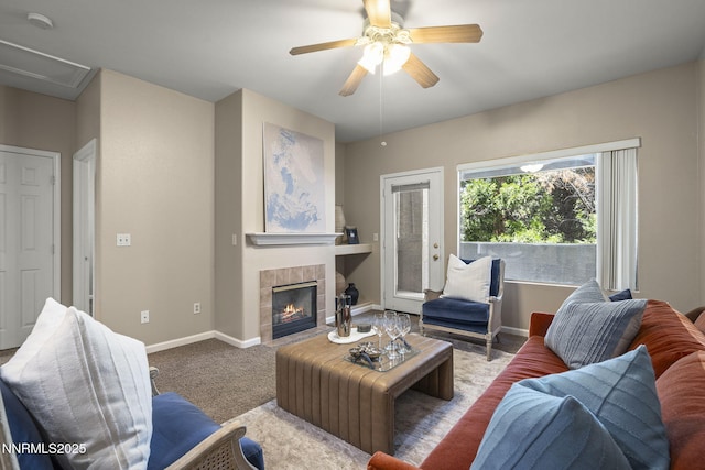 900 S Meadows Pkwy Unit 1223, Reno, NV 89521 - carpeted living room featuring baseboards, a tile fireplace, and a ceiling fan