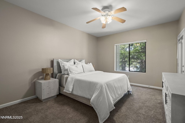 900 S Meadows Pkwy Unit 1223, Reno, NV 89521 - bedroom with baseboards, dark colored carpet, and a ceiling fan