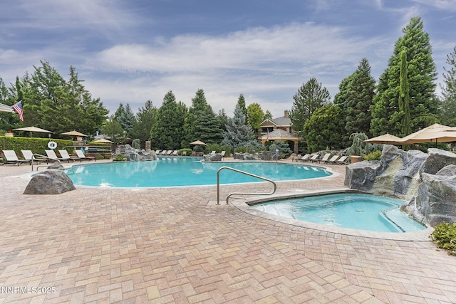 900 S Meadows Pkwy Unit 1223, Reno, NV 89521 - community pool with a patio area and a community hot tub
