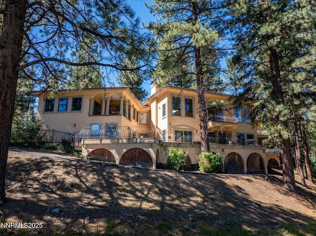 390 Sylvan Ct, Verdi, NV 89439 - back of property featuring stucco siding and a balcony