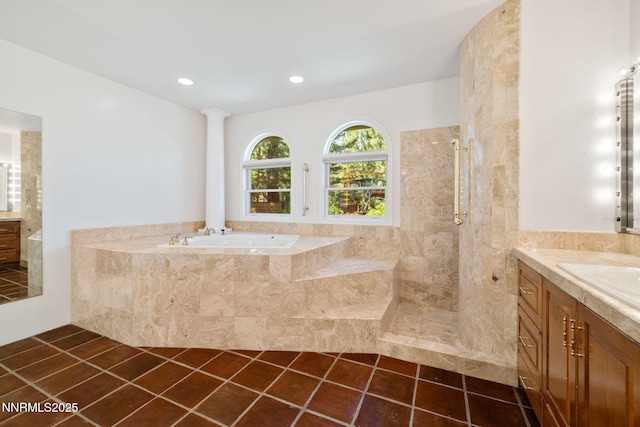 390 Sylvan Ct, Verdi, NV 89439 - bathroom with vanity, a garden tub, tiled shower, tile patterned floors, and recessed lighting