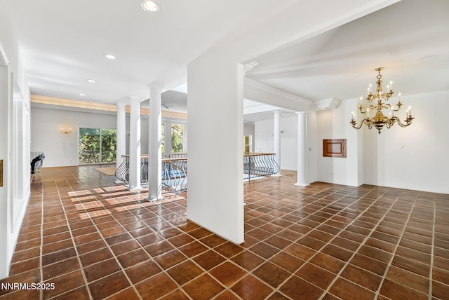 390 Sylvan Ct, Verdi, NV 89439 - corridor with dark tile patterned floors, ornamental molding, recessed lighting, ornate columns, and a chandelier