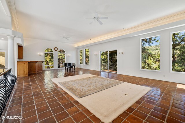 390 Sylvan Ct, Verdi, NV 89439 - living room with plenty of natural light, ceiling fan, and dark tile patterned floors