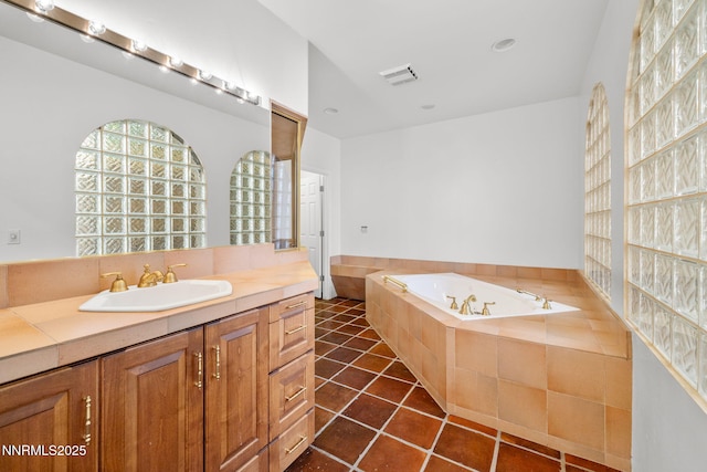 390 Sylvan Ct, Verdi, NV 89439 - full bath featuring a garden tub, vanity, and tile patterned flooring