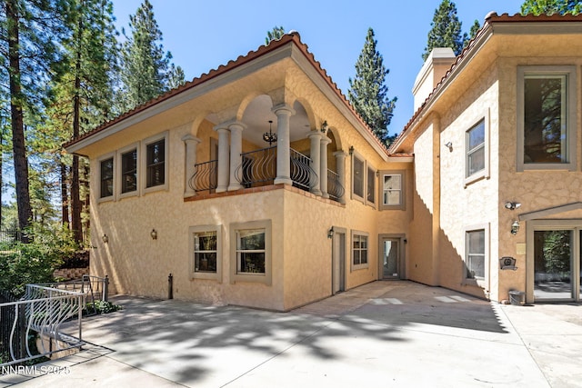 390 Sylvan Ct, Verdi, NV 89439 - back of house featuring a patio, stucco siding, and a tile roof