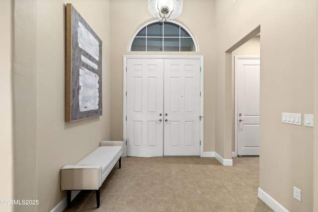 9845 Sea Breeze Ln, Reno, NV 89521 - foyer entrance featuring baseboards and light tile patterned floors