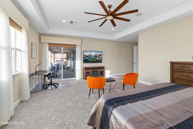 9845 Sea Breeze Ln, Reno, NV 89521 - carpeted bedroom featuring access to outside, a tray ceiling, baseboards, recessed lighting, and a ceiling fan