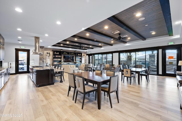 9845 Sea Breeze Ln, Reno, NV 89521 - dining area featuring beam ceiling and light wood-type flooring