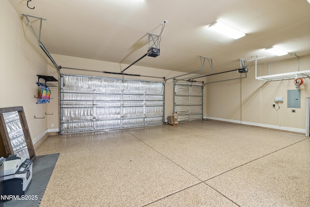 9845 Sea Breeze Ln, Reno, NV 89521 - garage with a garage door opener, baseboards, and electric panel