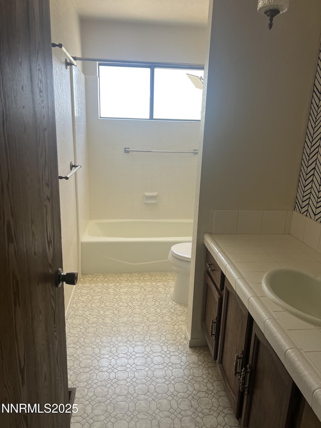 124 Mark Twain Ave, Reno, NV 89509 - bathroom with toilet, vanity, and washtub / shower combination