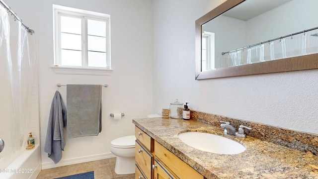 5895 Brooke Dr, Winnemucca, NV 89445 - bathroom with tile patterned flooring, toilet, vanity, baseboards, and shower / bathtub combination with curtain