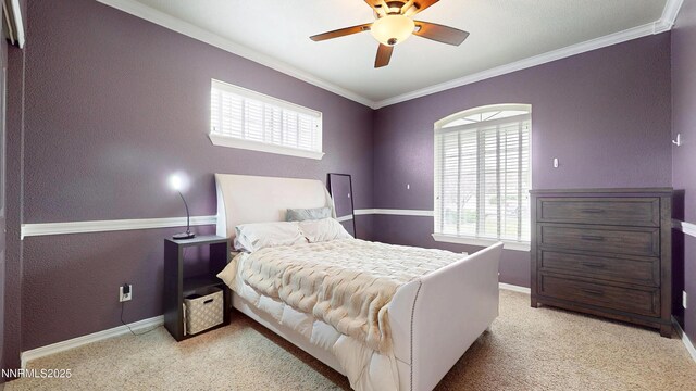 5895 Brooke Dr, Winnemucca, NV 89445 - bedroom with multiple windows, crown molding, light carpet, and baseboards