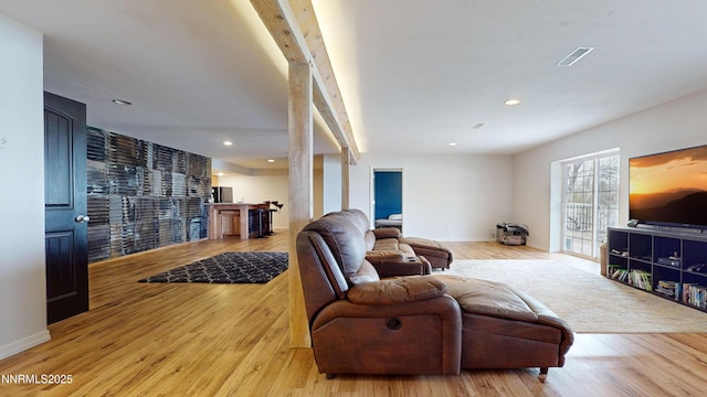 5895 Brooke Dr, Winnemucca, NV 89445 - living area featuring wood finished floors, recessed lighting, baseboards, and beam ceiling