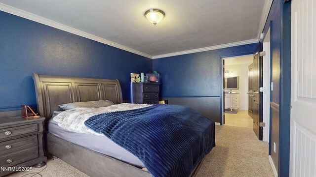 5895 Brooke Dr, Winnemucca, NV 89445 - bedroom with ornamental molding, light colored carpet, and ensuite bathroom