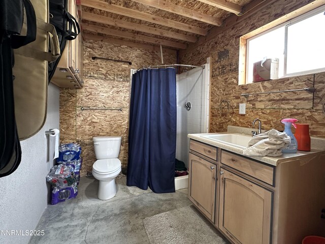5895 Brooke Dr, Winnemucca, NV 89445 - full bathroom featuring a stall shower, toilet, vanity, and concrete floors
