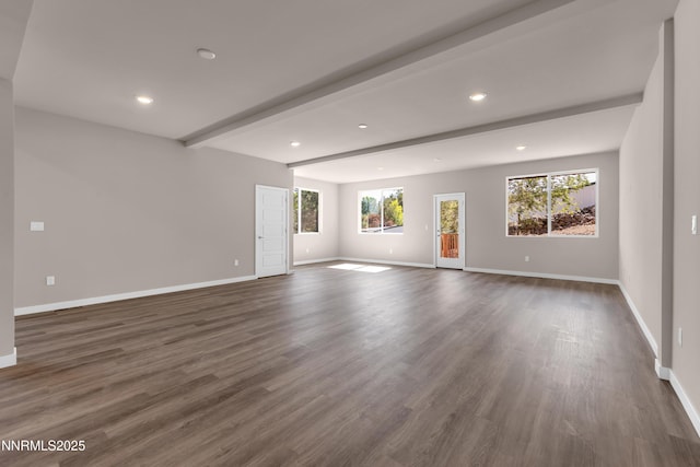 1460 Copper Point Cir, Reno, NV 89519 - empty room featuring healthy amount of natural light, recessed lighting, beam ceiling, baseboards, and dark wood finished floors