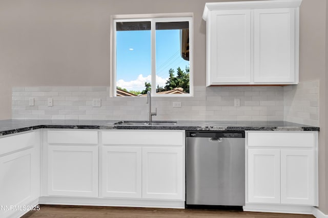 1460 Copper Point Cir, Reno, NV 89519 - kitchen with stainless steel dishwasher, a sink, dark stone counters, and backsplash