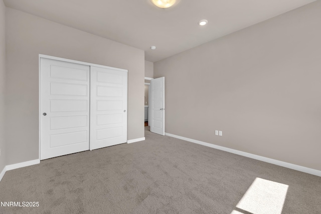 1460 Copper Point Cir, Reno, NV 89519 - unfurnished bedroom with carpet floors, a closet, baseboards, and recessed lighting
