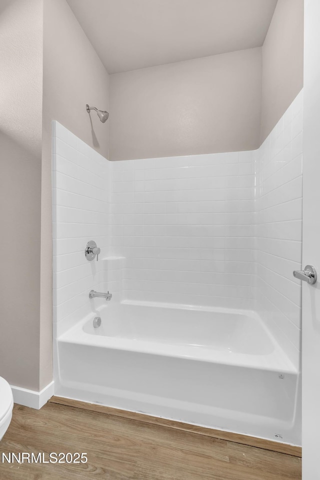 1460 Copper Point Cir, Reno, NV 89519 - bathroom with toilet, wood finished floors,  shower combination, and baseboards